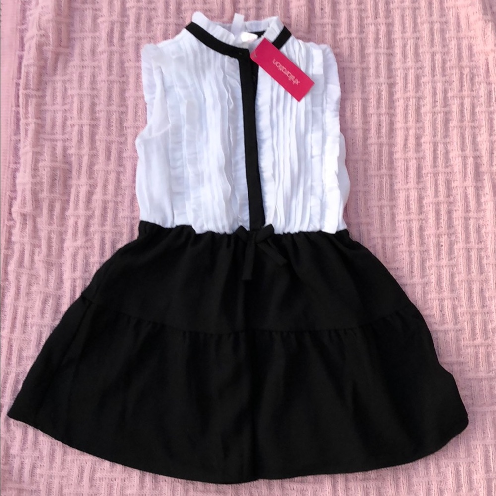 Dress Size 4/5. Brand new with tags.